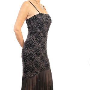 Black formal dress, both sheik and sexy. Rose gold accents.